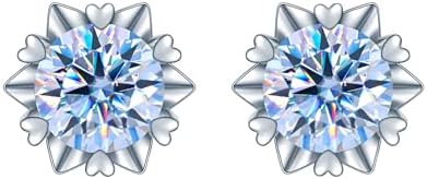 Close-up of a 14K gold heart snowflake stud earring with a blue diamond.