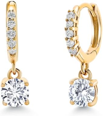 Close-up of a single 10K yellow gold huggie hoop earring with a dangling birthstone and lab-grown diamond.